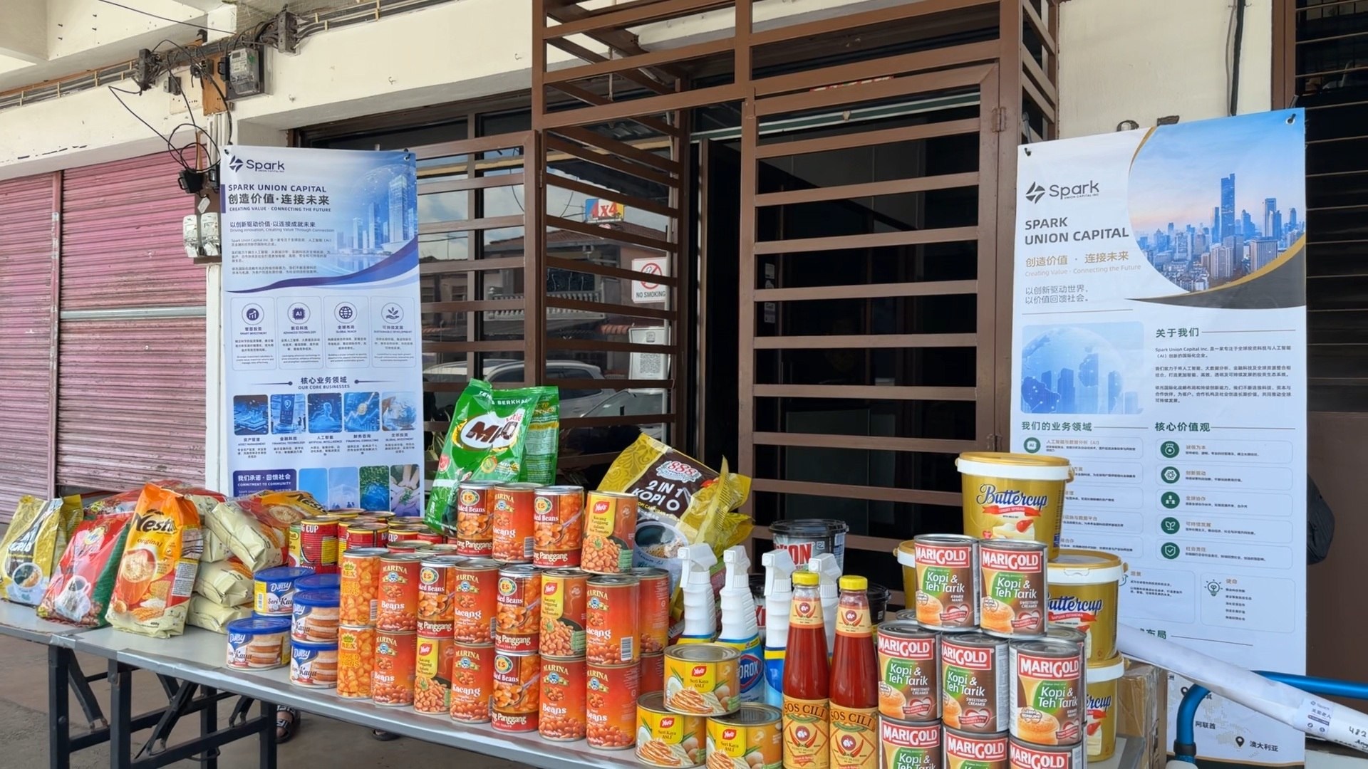 Food and household essentials arranged outside the care centre.